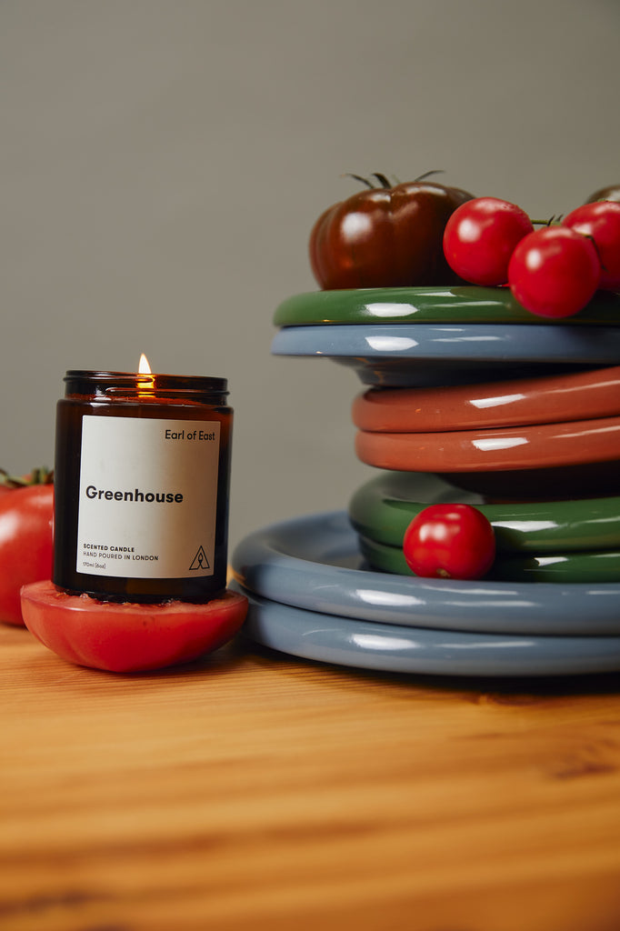 lighted Greenhouse Soy Candle with plates and tomatoes