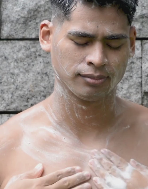 Man Using Powder Wash in the Shower