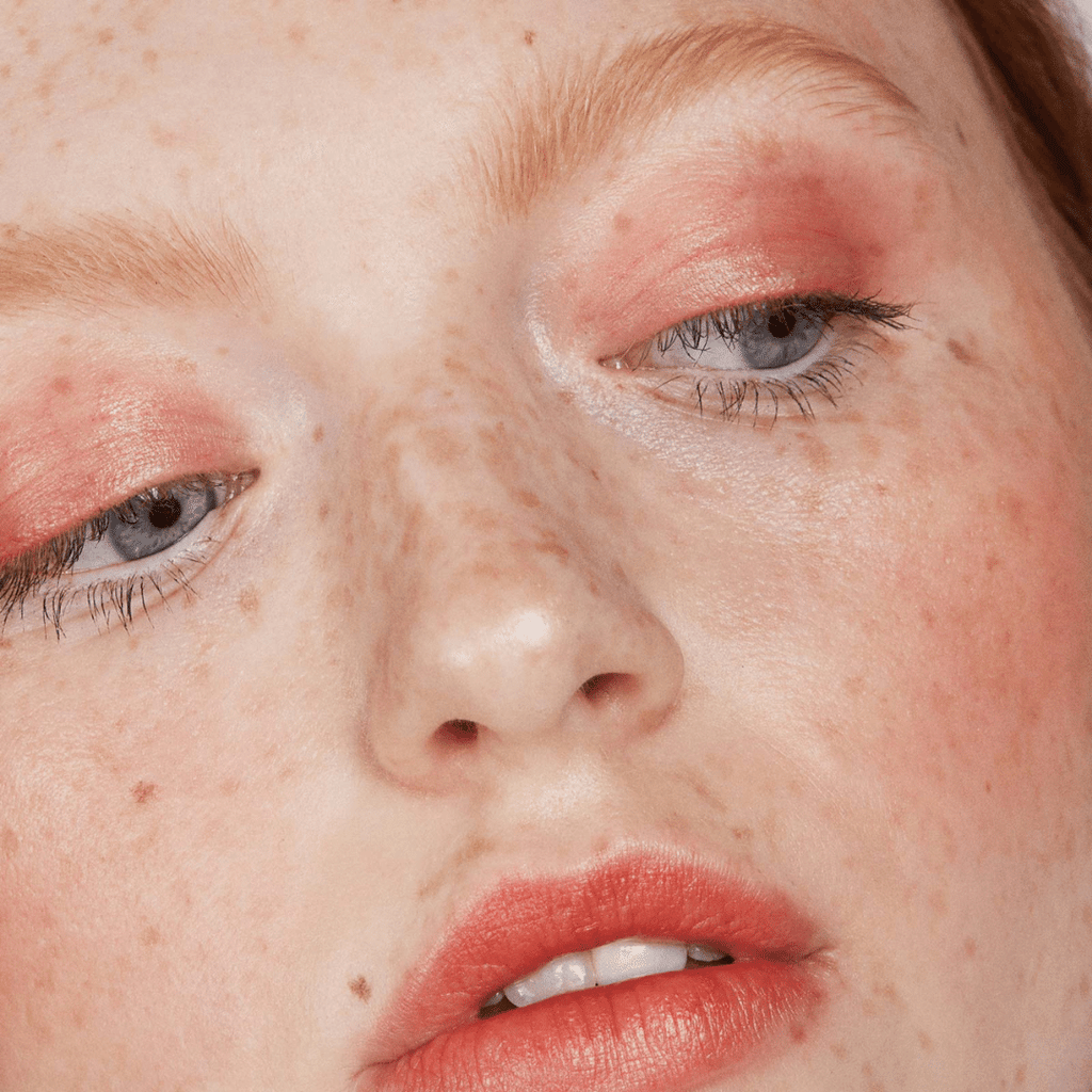 close up of woman with fair skin wearing Strawberry Lip-to-Lid Balmie