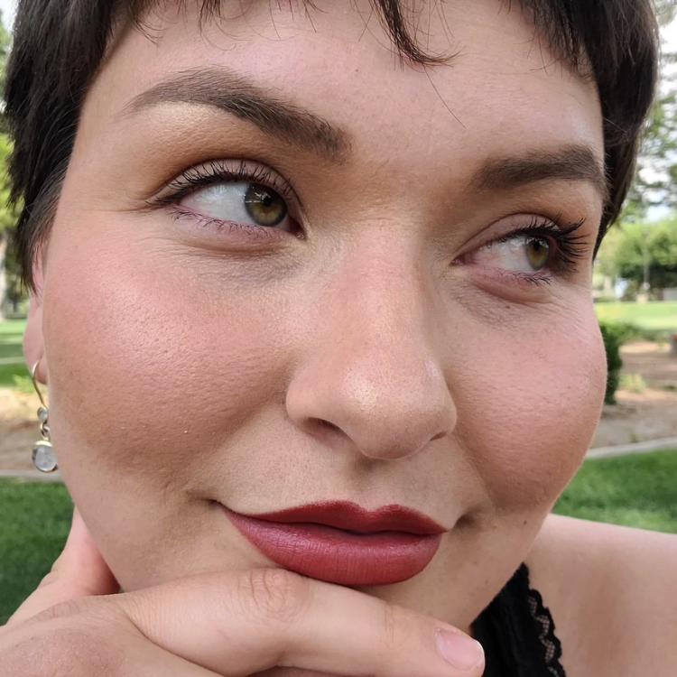 close up of lips of woman wearing True - Deep Scarlet Color Cream Multi-stick