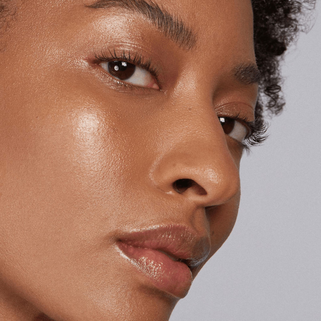 best tinted lip balm + more for woman with dark skin tone