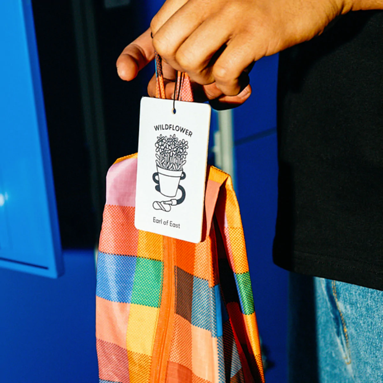 Wild Flower Air Freshener hanging on a bag