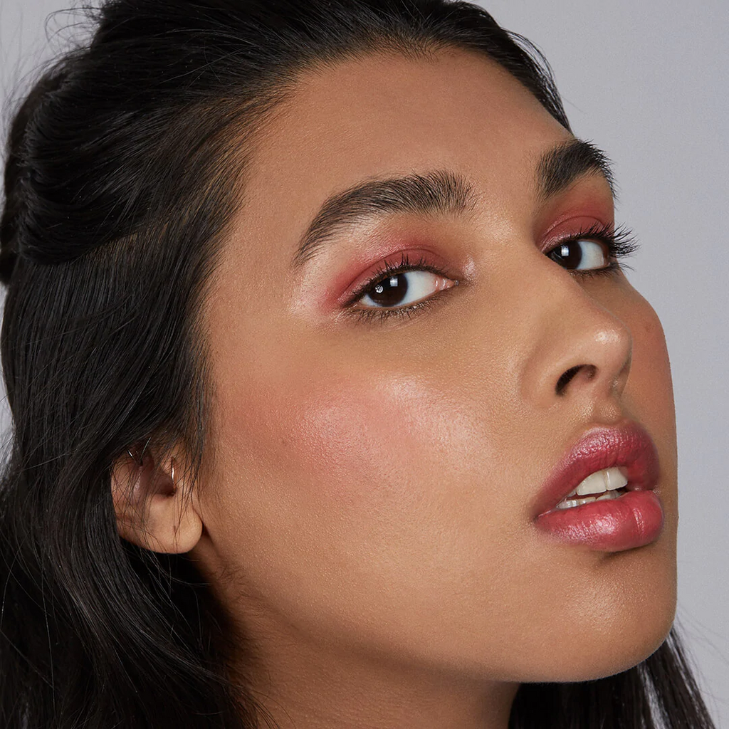 woman with medium skin tone wearing Watermelon Lip-to-Lid Balmie