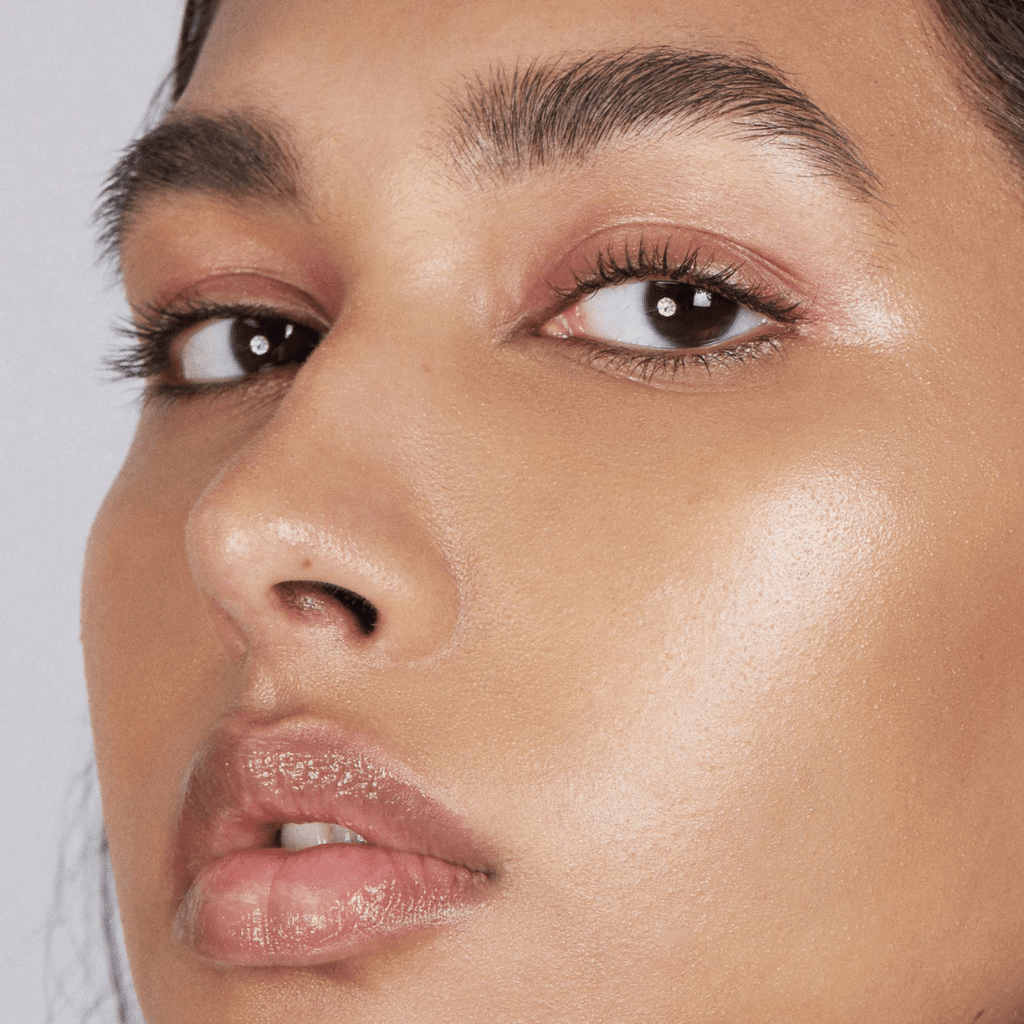 woman with medium skin tone wearing Caramel Lip-to-Lid Balmie