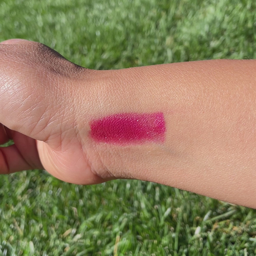 Raspberry Lip-to-Lid Balmie swatch on wrist