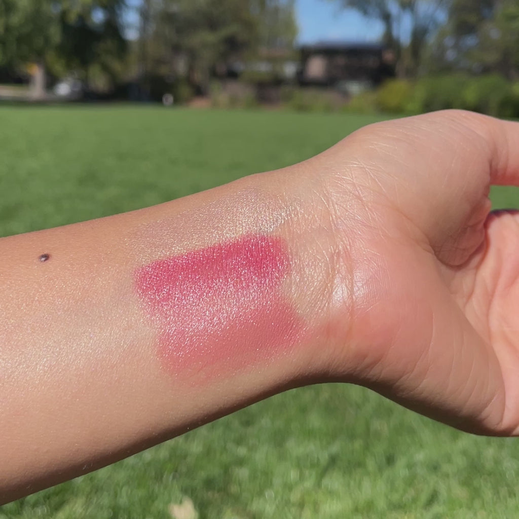 swatches of Malibu Magic Lip-to-Lid Balmies on arm