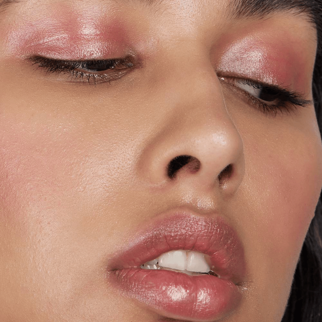 close of medium skin tone with Nude Plum Lip-to-Lid Balmie