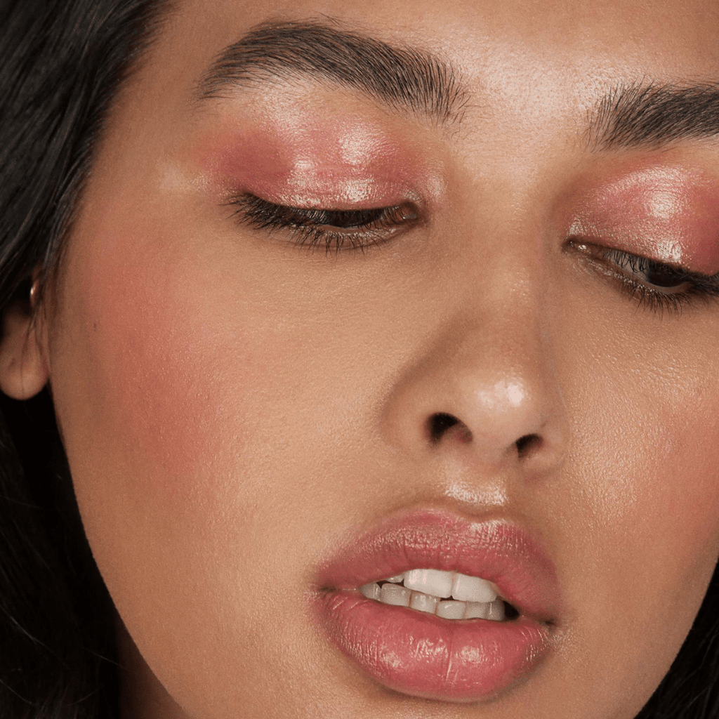 woman with medium skin tone wearing Peach Lip-to-Lid Balmie