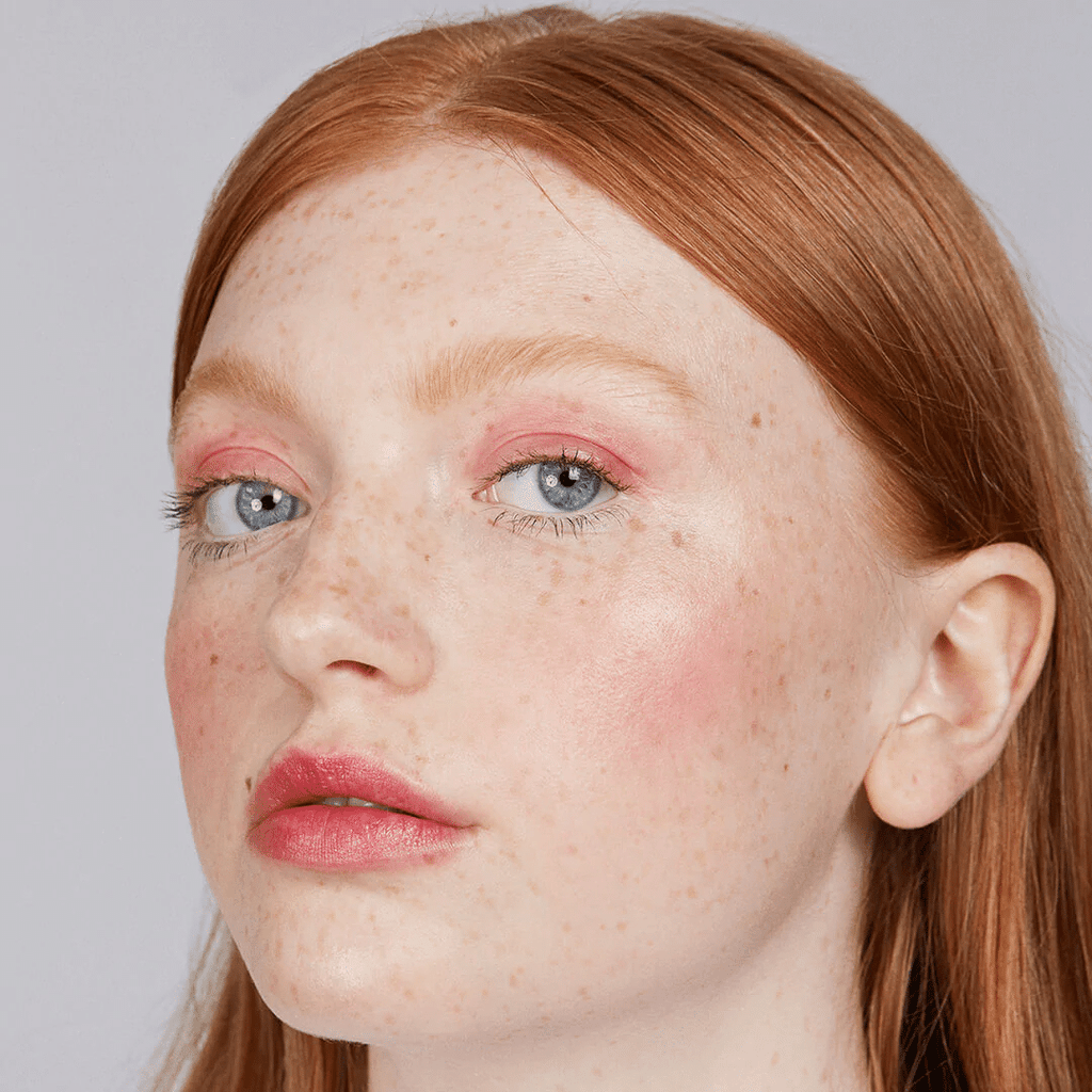 woman with fair skin tone wearing Raspberry Lip-to-Lid Balmie