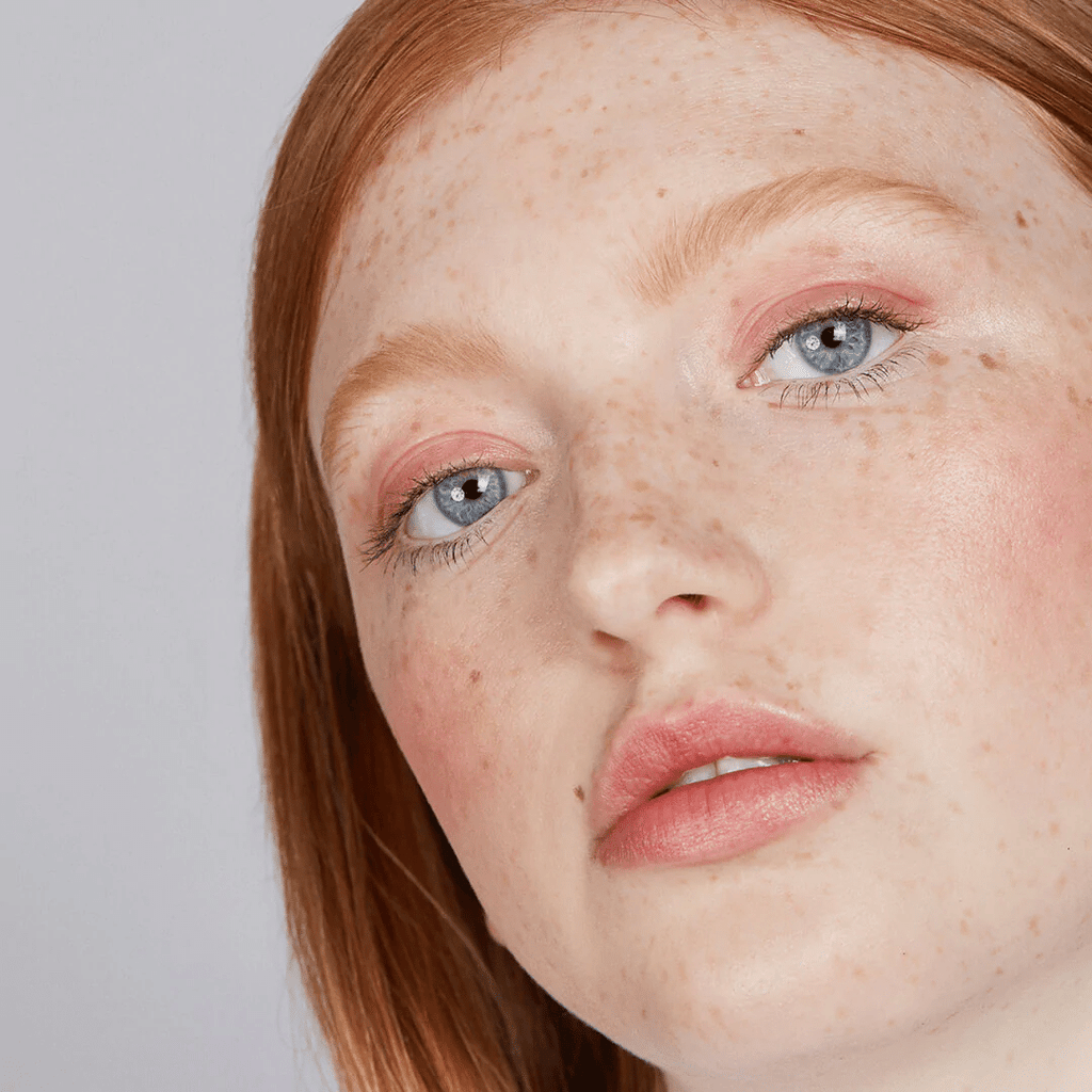 woman with fair skin tone wearing Nude Plum Lip-to-Lid Balmie