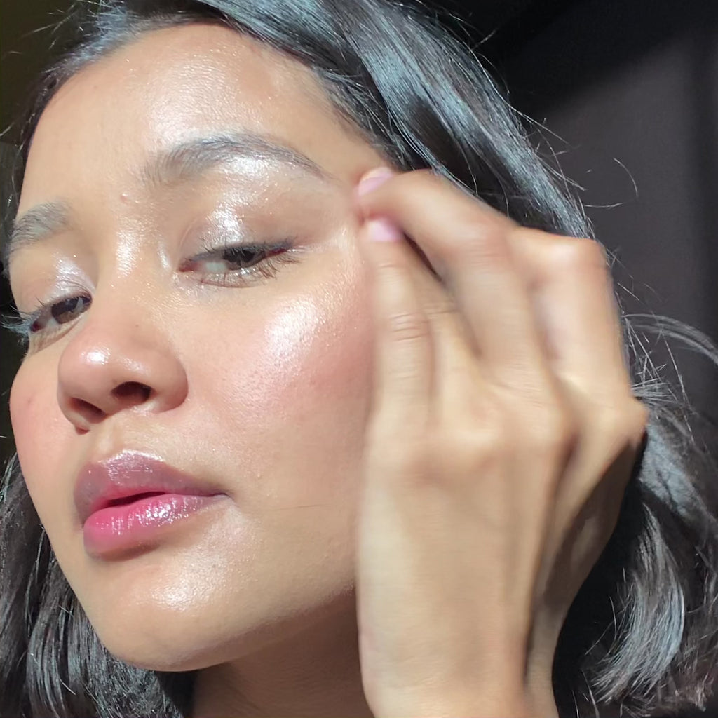 woman applying Caramel Lip-to-Lid Balmie on face