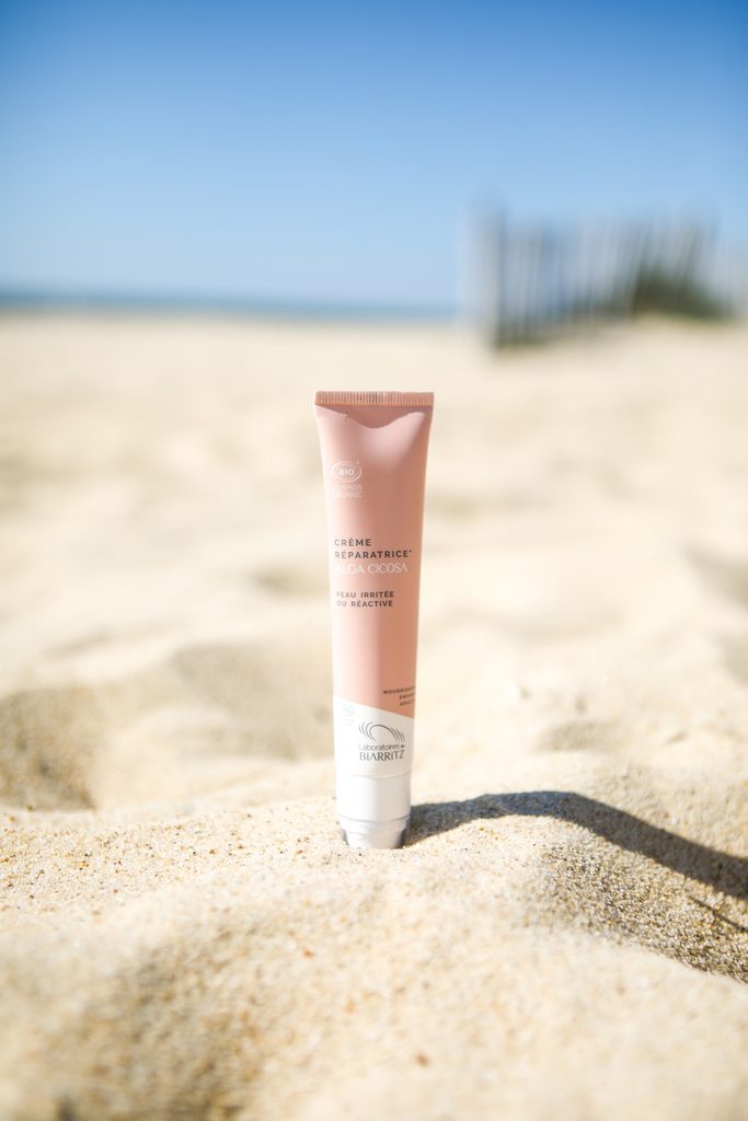 Organic Reparative Skin Cream with beach background